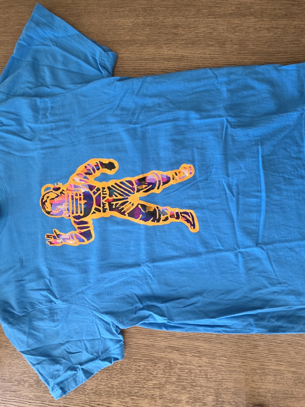 Billionaire Boys Club Blue Tee with Multicolor Astronaut Graphic
